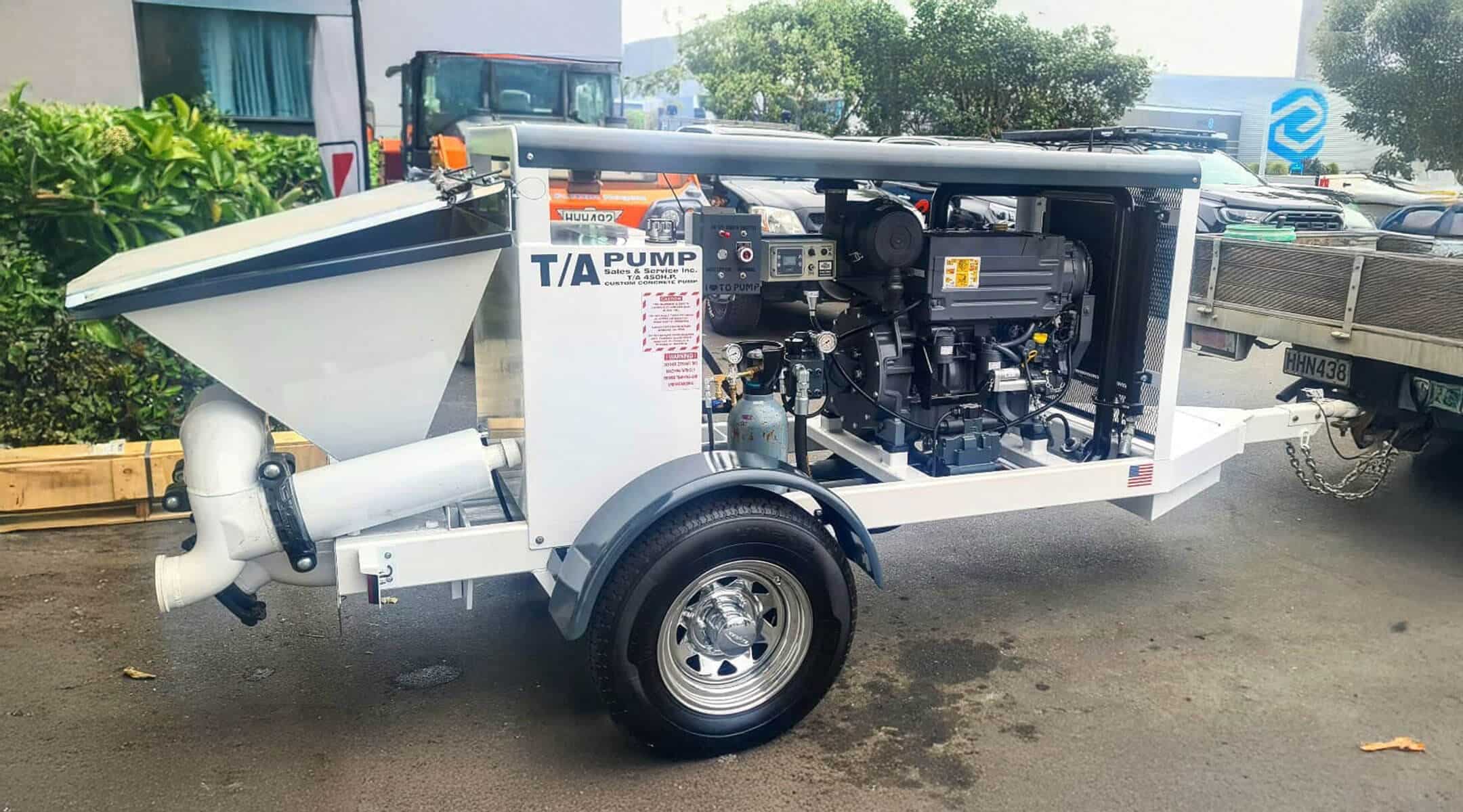 Concrete Pump trailer mounted with diesel engine.