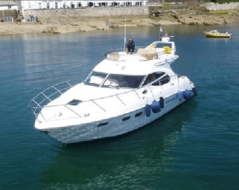 Large yacht with marine diesel engine idling offshore